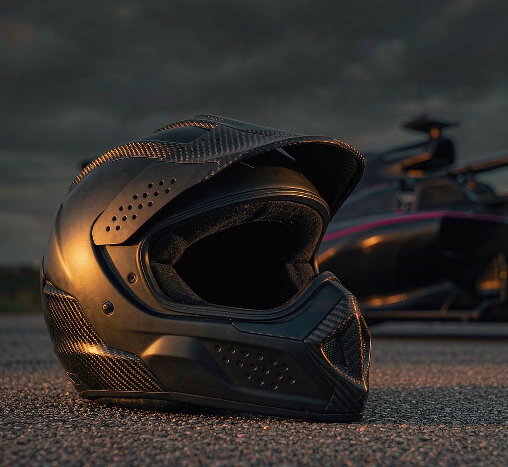 Racing helmet on tarmac